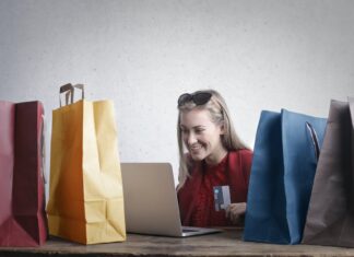 happy woman shopping online at home